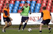 13 July 2005; Striker George O'Callaghan, centre, in action against team-mates Derek Coughlan, left, and Roy O'Donovan during squad training. Cork City squad training, Aukstaitija, Paneveyzs, Lithuania. Picture credit; Brian Lawless / SPORTSFILE
