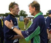 13 July 2005; Ireland coach Adrian Birrell, right, congratulates Scotland's Douglas Brown after the game. ICC Trophy Final, Ireland v Scotland, Castle Avenue, Clontarf, Dublin. Picture credit; Pat Murphy / SPORTSFILE