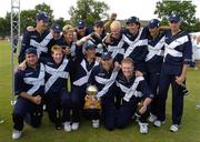13 July 2005; The Scotland players celebrate with the cup after victory over Ireland. ICC Trophy Final, Ireland v Scotland, Castle Avenue, Clontarf, Dublin. Picture credit; Pat Murphy / SPORTSFILE
