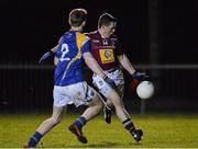 19 February 2014; Lorcan Dolan, Westmeath, in action against Cian Farrelly, Longford. Cadbury Leinster GAA Under 21 Football Championship, First Round, Longford v Westmeath, Newtowncashel, Co. Longford. Picture credit: Ramsey Cardy / SPORTSFILE