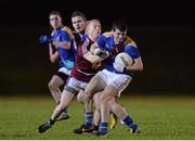 19 February 2014; Barry McKeon, Longford, in action against Alan Coffey, Westmeath. Cadbury Leinster GAA Under 21 Football Championship, First Round, Longford v Westmeath, Newtowncashel, Co. Longford. Picture credit: Ramsey Cardy / SPORTSFILE