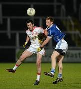 19 February 2014; PJ Lavery, Tyrone, in action against Damien Barkey, Cavan. Power NI Dr. McKenna Cup Final, Cavan v Tyrone, Athletic Grounds, Armagh. Picture credit: Oliver McVeigh / SPORTSFILE