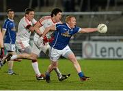 19 February 2014; Cian Mackey, Cavan, in action against Sean Cavanagh, Tyrone. Power NI Dr. McKenna Cup Final, Cavan v Tyrone, Athletic Grounds, Armagh. Picture credit: Oliver McVeigh / SPORTSFILE