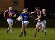 19 February 2014; Emmet Noonan, Longford, in action against Paddy Holloway, Westmeath. Cadbury Leinster GAA Under 21 Football Championship, First Round, Longford v Westmeath, Newtowncashel, Co. Longford. Picture credit: Ramsey Cardy / SPORTSFILE