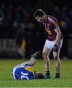 19 February 2014; Paddy Holloway, Westmeath, has an altercation with Emmet Noonan, Longford, off the ball. Cadbury Leinster GAA Under 21 Football Championship, First Round, Longford v Westmeath, Newtowncashel, Co. Longford. Picture credit: Ramsey Cardy / SPORTSFILE