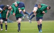 20 February 2014; Ireland's Andrew Trimble carries team-mate Peter O'Mahony during a warm-up drill at squad training ahead of their RBS Six Nations Rugby Championship match against England on Saturday. Ireland Rugby Squad Training, Carton House, Maynooth, Co. Kildare. Picture credit: Stephen McCarthy / SPORTSFILE