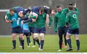 20 February 2014; Ireland's Jordi Murphy carries Andrew Boyle during a warm-up drill at squad training ahead of their RBS Six Nations Rugby Championship match against England on Saturday. Ireland Rugby Squad Training, Carton House, Maynooth, Co. Kildare. Picture credit: Stephen McCarthy / SPORTSFILE