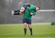 20 February 2014; Ireland's Mike Ross carries Cian Healy during a warm-up drill at squad training ahead of their RBS Six Nations Rugby Championship match against England on Saturday. Ireland Rugby Squad Training, Carton House, Maynooth, Co. Kildare. Picture credit: Stephen McCarthy / SPORTSFILE