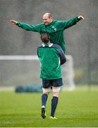 20 February 2014; Ireland's Rory Best is lifted by Jamie Heaslip during a warm-up drill at squad training ahead of their RBS Six Nations Rugby Championship match against England on Saturday. Ireland Rugby Squad Training, Carton House, Maynooth, Co. Kildare. Picture credit: Stephen McCarthy / SPORTSFILE