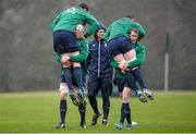 20 February 2014; Ireland's Paul O'Connell lifts Devin Toner, left, and Andrew Trimble lifts Peter O'Mahony, right, during a warm-up drill at squad training ahead of their RBS Six Nations Rugby Championship match against England on Saturday. Ireland Rugby Squad Training, Carton House, Maynooth, Co. Kildare. Picture credit: Stephen McCarthy / SPORTSFILE