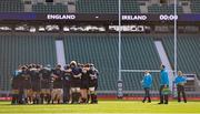21 February 2014; The England team gather together in a huddle as assistant coach Graham Rowntree and head coach Stuart Lancaster, right, look on during the captain's run ahead of their RBS Six Nations Rugby Championship 2014 match against Ireland on Saturday. England Rugby Squad Captain's Run, Twickenham Stadium, Twickenham, London, England. Picture credit: Brendan Moran / SPORTSFILE