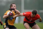 21 February 2014; Eamonn Wallace, NUI Maynooth, in action against Tom Clancy, University College Cork. Irish Daily Mail Sigerson Cup, Semi-Final, NUI Maynooth v University College Cork. The Dub, Queen's University, Belfast, Co. Antrim. Picture credit: Oliver McVeigh / SPORTSFILE