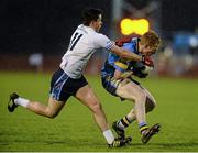 21 February 2014; Ciaran Lenahan, University College Dublin, in action against Ronan O'Neill, University of Ulster Jordanstown. Irish Daily Mail Sigerson Cup, Semi-Final, University of Ulster Jordanstown v University College Dublin. The Dub, Queen's University, Belfast, Co. Antrim. Picture credit: Oliver McVeigh / SPORTSFILE