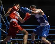 21 February 2014; Declan Geraghty, left, Crumlin boxing club, exchanges punches with Francis Campbell, Crumlin boxing club, during their 60kg bout. National Senior Boxing Championships, First Round, National Stadium, Dublin. Picture credit: David Maher / SPORTSFILE