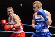 21 February 2014; Martin Noonan, right, Riverstown boxing club, exchanges punches with Sean Montgomery, Canal boxing club, during their 64kg bout. National Senior Boxing Championships, First Round, National Stadium, Dublin. Picture credit: David Maher / SPORTSFILE