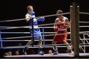 21 February 2014; Sean Duffy, right, Holy Trinity boxing club, exchanges punches with Paul Hyland, Gleann boxing club, during their 64kg bout. National Senior Boxing Championships, First Round, National Stadium, Dublin. Picture credit: David Maher / SPORTSFILE