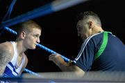 21 February 2014; Boxing coach Billy Walsh, with his nephew  Dean Walsh, St Ibars and st Joseph's boxing club, during rounds in his  their 64kg bout against Jason Conroy, Crumlin boxing club. National Senior Boxing Championships, First Round, National Stadium, Dublin. Picture credit: David Maher / SPORTSFILE