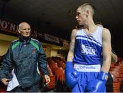 21 February 2014; Former boxing coach, Liam Walsh, with his grandson, Dean Walsh, St Ibar's and St Joseph's boxing club, before the start of his 64kg bout against Jason Conroy, Crumlin boxing club. National Senior Boxing Championships, First Round, National Stadium, Dublin. Picture credit: David Maher / SPORTSFILE