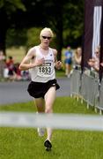 10 July 2005; Keith Kelly, Drogheda, approaches the finish to win the adidas Irish Runner Challenge in a time of 23.37. Phoenix Park, Dublin.. Picture credit; Brian Lawless / SPORTSFILE