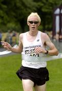 10 July 2005; Keith Kelly, Drogheda, crosses the finish to win the adidas Irish Runner Challenge in a time of 23.37. Phoenix Park, Dublin.. Picture credit; Brian Lawless / SPORTSFILE