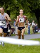 10 July 2005; Pauline Curley, Tullamore Harriers, approaches the finish to be the first woman home during the adidas Irish Runner Challenge in a time of 27.08. Phoenix Park, Dublin.. Picture credit; Brian Lawless / SPORTSFILE