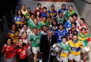 11 July 2005; An Taoiseach, Bertie Ahern TD, with players from all 32 counties at the launch of the 2005 TG4 All-Ireland Ladies Football Championship. Croke Park, Dublin. Picture credit; David Maher / SPORTSFILE