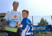 12 July 2005; Republic of Ireland manager Brian Kerr with 7 year old Gary O'Connor, winner of the FAI Pepsi Summer Soccer School Dream Prize to train with Real Madrid's David Beckham in London. Templeogue FC, Tymon Park, Templeogue, Dublin. Picture credit; Pat Murphy / SPORTSFILE