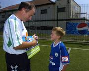 12 July 2005; Republic of Ireland manager Brian Kerr in conversation with 7 year old Gary O'Connor, winner of the FAI Pepsi Summer Soccer School Dream Prize to train with Real Madrid's David Beckham in London. Templeogue FC, Tymon Park, Templeogue, Dublin. Picture credit; Pat Murphy / SPORTSFILE