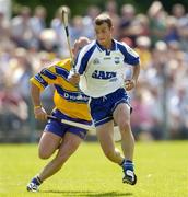 10 July 2005; Eoin McGrath, Waterford, in action against Colin Lynch, Clare. Guinness All-Ireland Senior Hurling Championship Qualifier, Round 3, Clare v Waterford, Cusack Park, Ennis, Co. Clare. Picture credit; Damien Eagers / SPORTSFILE