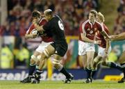 9 July 2005; Donnacha O'Callaghan, British and Irish Lions, is tackled by Jerry Collins, New Zealand. British and Irish Lions Tour to New Zealand 2005, 3rd Test, New Zealand v British and Irish Lions, Eden Park, Auckland, New Zealand. Picture credit; Brendan Moran / SPORTSFILE