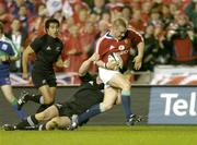 9 July 2005; Gethin Jenkins, British and Irish Lions, is tackled by Tony Woodcock, New Zealand. British and Irish Lions Tour to New Zealand 2005, 3rd Test, New Zealand v British and Irish Lions, Eden Park, Auckland, New Zealand. Picture credit; Brendan Moran / SPORTSFILE