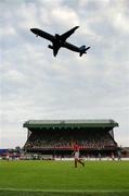 13 July 2005; An aeroplane flies overhead during the game. UEFA Champions League Qualifier, 1st Leg, Glentoran v Shelbourne, The Oval, Belfast. Picture credit; David Maher / SPORTSFILE