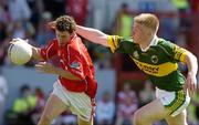 10 July 2005; Anthony Fenton, Cork, in action against Eamon Hickson, Kerry. Munster Minor Football Championship Final, Cork v Kerry, Pairc Ui Chaoimh, Cork. Picture credit; Matt Browne / SPORTSFILE