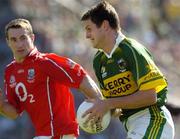10 July 2005; Eoin Brosnan, Kerry, in action against Eoin Sexton, Cork. Bank of Ireland Munster Senior Football Championship Final, Cork v Kerry, Pairc Ui Chaoimh, Cork. Picture credit; Matt Browne / SPORTSFILE