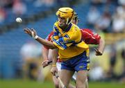 13 July 2005; Darragh Clancy, Clare, in action against Stephen O'Sullivan, Cork. Erin Munster Under 21 Hurling Championship Semi-final, Clare v Cork, Semple Stadium, Thurles, Co. Tipperary. Picture credit; Matt Browne / SPORTSFILE