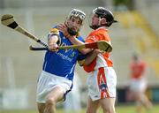 16 July 2005; Gareth Ghee, Longford, is tackled by Brian Mallon, Armagh. Nicky Rackard Cup, Group C Quarter-Final Play Off, Longford v Armagh, Kingspan Breffni Park, Cavan. Picture credit; Damien Eagers / SPORTSFILE