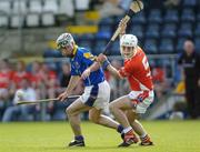 16 July 2005; Gareth Ghee, Longford, in action against Mark Hogan, Armagh. Nicky Rackard Cup, Group C Quarter-Final Play Off, Longford v Armagh, Kingspan Breffni Park, Cavan. Picture credit; Damien Eagers / SPORTSFILE