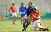 16 July 2005; Eddie Ferran, Armagh, is tackled by Sean Browne, Longford. Nicky Rackard Cup, Group C Quarter-Final Play Off, Longford v Armagh, Kingspan Breffni Park, Cavan. Picture credit; Damien Eagers / SPORTSFILE