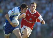 16 July 2005; Hugh McElroy, Monaghan, is tackled by Jamie Carr, Louth. Bank of Ireland All-Ireland Senior Football Championship Qualifier, Round 3, Louth v Monaghan, Kingspan Breffni Park, Cavan. Picture credit; Damien Eagers / SPORTSFILE