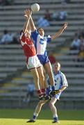 16 July 2005; Nicky McDonnell, Louth, contests a high ball with Paul Finlay, Monaghan. Bank of Ireland All-Ireland Senior Football Championship Qualifier, Round 3, Louth v Monaghan, Kingspan Breffni Park, Cavan. Picture credit; Damien Eagers / SPORTSFILE