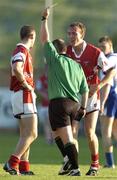 16 July 2005; Referee, Marty Duffy sends off Louth's Nicky McDonnell, right. Bank of Ireland All-Ireland Senior Football Championship Qualifier, Round 3, Louth v Monaghan, Kingspan Breffni Park, Cavan. Picture credit; Damien Eagers / SPORTSFILE
