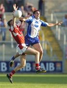 16 July 2005; Nicky McDonnell, Louth, is tackled by Paul Finlay, Monaghan. Bank of Ireland All-Ireland Senior Football Championship Qualifier, Round 3, Louth v Monaghan, Kingspan Breffni Park, Cavan. Picture credit; Damien Eagers / SPORTSFILE