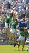 17 July 2005; Meath and Cavan players contest a high ball from left to right, Nigel Crawford, Meath, Darren Day, Meath, Nicholas Walsh, Cavan, and Anthony Moyles, Meath. Bank of Ireland All-Ireland Senior Football Championship Qualifier, Round 3, Meath v Cavan, St. Tighernach's Park, Clones, Co. Monaghan. Picture credit; Damien Eagers / SPORTSFILE