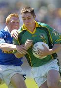 17 July 2005; Stephen Bray, Meath, is tackled by Pauric O'Reilly, Cavan. Bank of Ireland All-Ireland Senior Football Championship Qualifier, Round 3, Meath v Cavan, St. Tighernach's Park, Clones, Co. Monaghan. Picture credit; Damien Eagers / SPORTSFILE