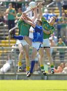 17 July 2005; Nigel Crawford, left, and Tomas O'Connor, Meath, contest a high ball with Nicholas Walsh, Cavan. Bank of Ireland All-Ireland Senior Football Championship Qualifier, Round 3, Meath v Cavan, St. Tighernach's Park, Clones, Co. Monaghan. Picture credit; Damien Eagers / SPORTSFILE