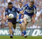 17 July 2005; Jason Sherlock, Dublin, in action against Colm Begley, Laois. Bank of Ireland Leinster Senior Football Championship Final, Dublin v Laois, Croke Park, Dublin. Picture credit; Brian Lawless / SPORTSFILE