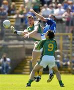 17 July 2005; Nigel Crawford and Anthony Moyles, (9), Meath, in action against Pierce McKenna, Cavan. Bank of Ireland All-Ireland Senior Football Championship Qualifier, Round 3, Meath v Cavan, St. Tighernach's Park, Clones, Co. Monaghan. Picture credit; Damien Eagers / SPORTSFILE