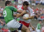 17 July 2005; Eoin Bradley, Derry, is tackled by John Galvin, Limerick. Bank of Ireland All-Ireland Senior Football Championship Qualifier, Round 3, Derry v Limerick, McHale Park, Castlebar, Co. Mayo. Picture credit; Pat Murphy / SPORTSFILE