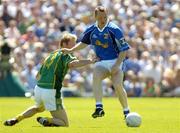 17 July 2005; Jason O'Reilly, Cavan, is tackled by Graham Geraghty, Meath. Bank of Ireland All-Ireland Senior Football Championship Qualifier, Round 3, Meath v Cavan, St. Tighernach's Park, Clones, Co. Monaghan. Picture credit; Damien Eagers / SPORTSFILE