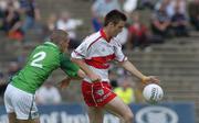 17 July 2005; Eoin Bradley, Derry, is tackled by Tommy Stack, Limerick. Bank of Ireland All-Ireland Senior Football Championship Qualifier, Round 3, Derry v Limerick, McHale Park, Castlebar, Co. Mayo. Picture credit; Pat Murphy / SPORTSFILE